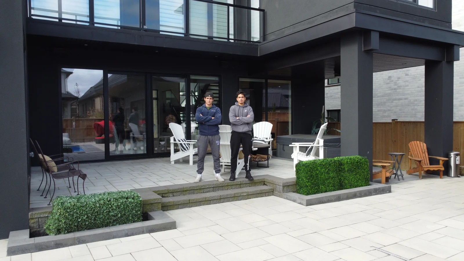 Brennan Panziera and Charles Van Hagen on a finished Fratelli Four backyard project