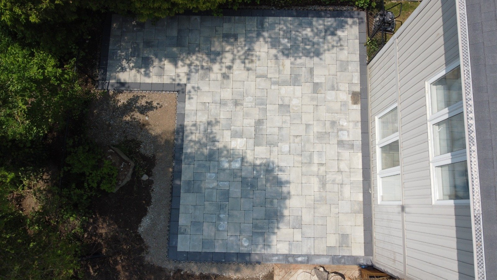 Aerial view of a finished interlock patio